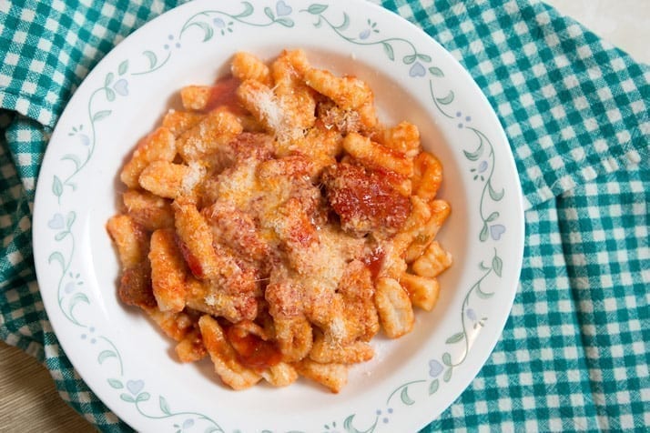 Fresh homemade potato gnocchi with spicy tomato sauce recipe and how-to