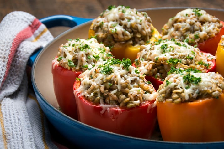healthy lentil and farro stuffed peppers with asiago, cream cheese and yogurt
